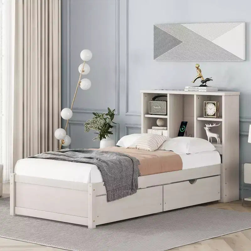 Base de cama individual moderna gris con puertos USB integrados, cabecero con estantería y dos cajones
